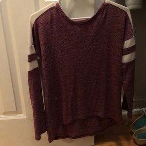 Maroon and cream sweater.